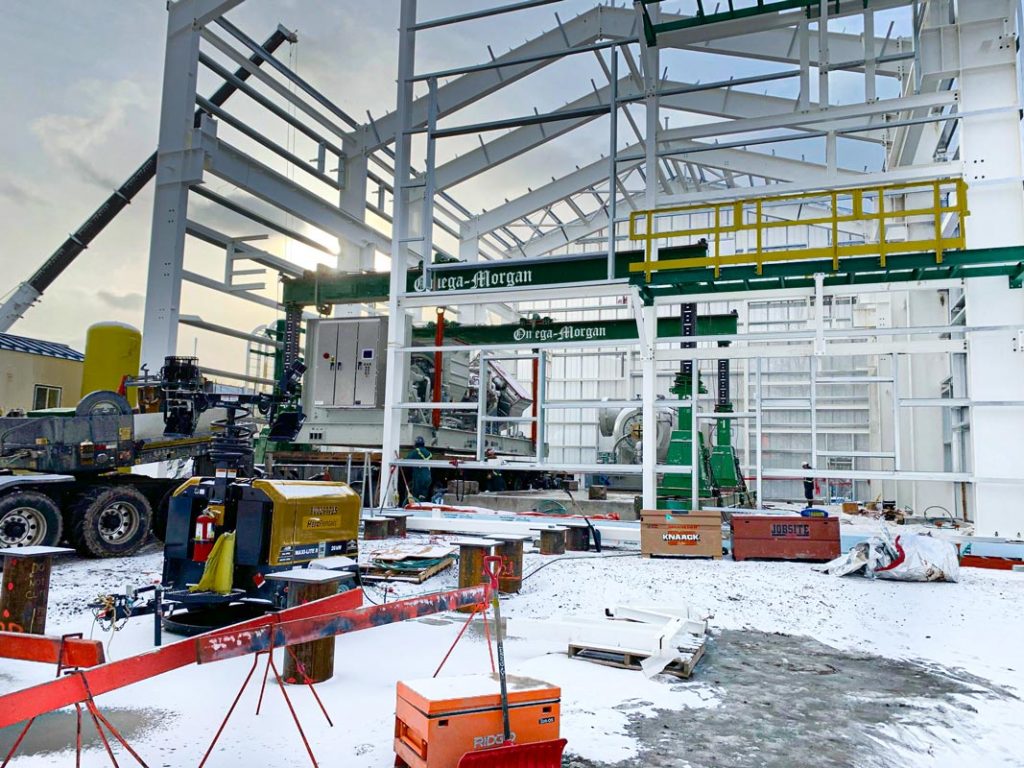 Omega Morgan heavy lift and rigging crew preparing to set a compressor and turbine into a compressor station in Western Canada.