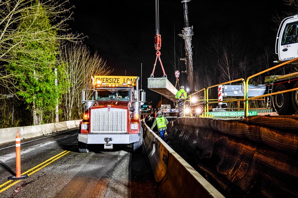 Omega Morgan crane services lifts a 63,200-pound girder