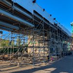 The shoring towers under the conveyor span, erected for safe demolition.