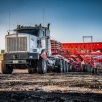 An Omega Morgan truck pulling a 500-ton suspension trailer.