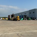 Omega Morgan’s crew prepares their equipment for safe machinery moving.