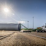 Wind energy component in transit by Omega Morgan’s specialized transportation team and double Schnabel trailer.